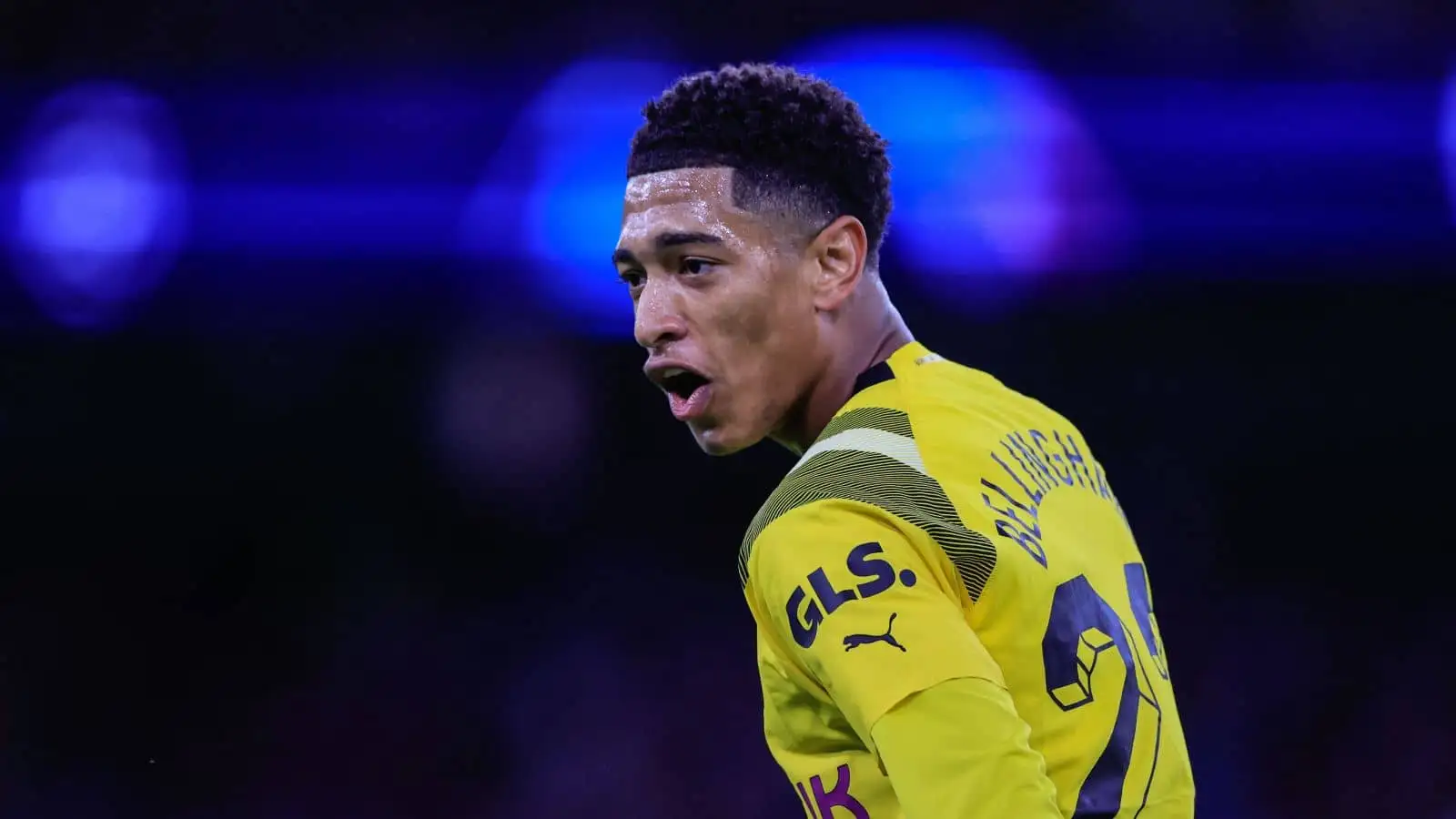 Jude Bellingham No 22 of Borussia Dortmund reacts to a challenge during the UEFA Champions League match Manchester City vs Borussia Dortmund at Etihad Stadium, Manchester