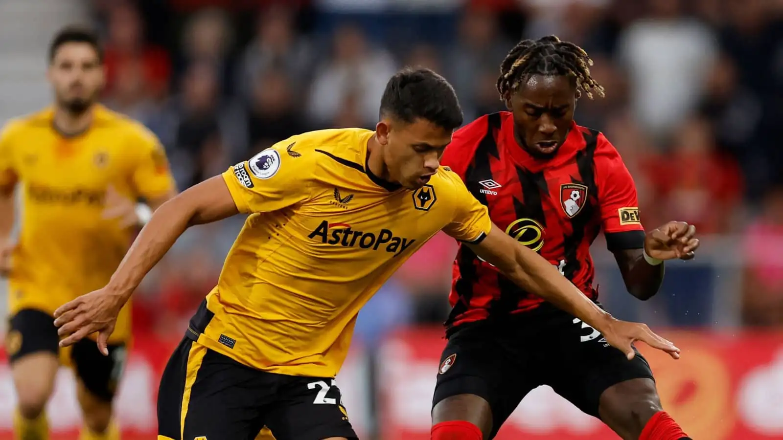 Wolves midfielder Matheus Nunes battling Bournemouth star Jordan Zemura