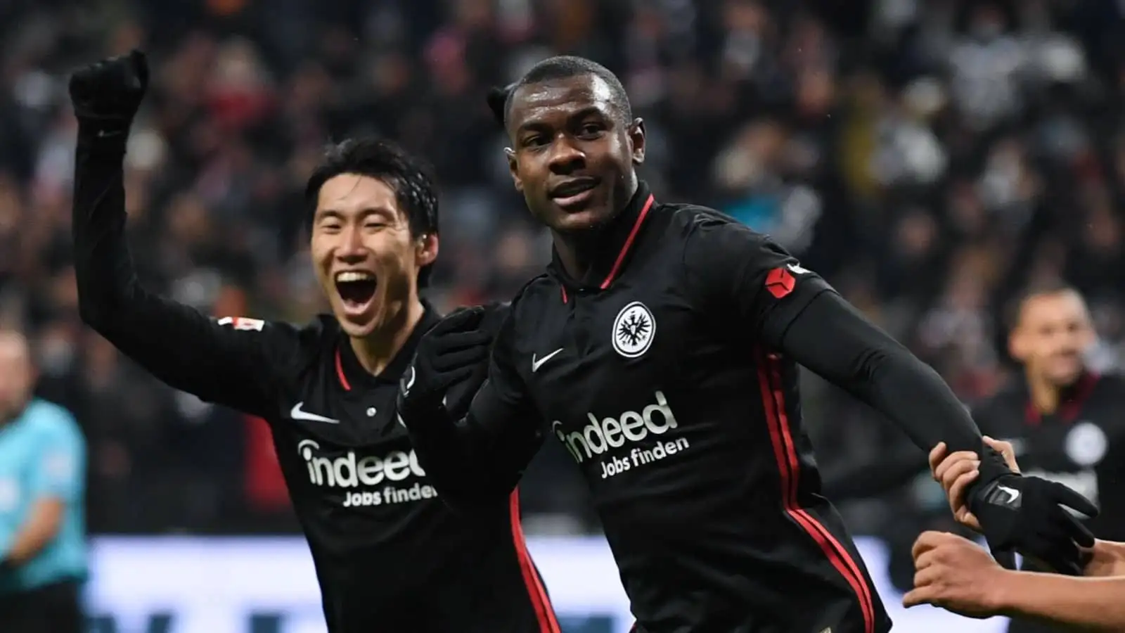 Eintracht Frankfurt players Evan N'Dicka and Daichi Kamada