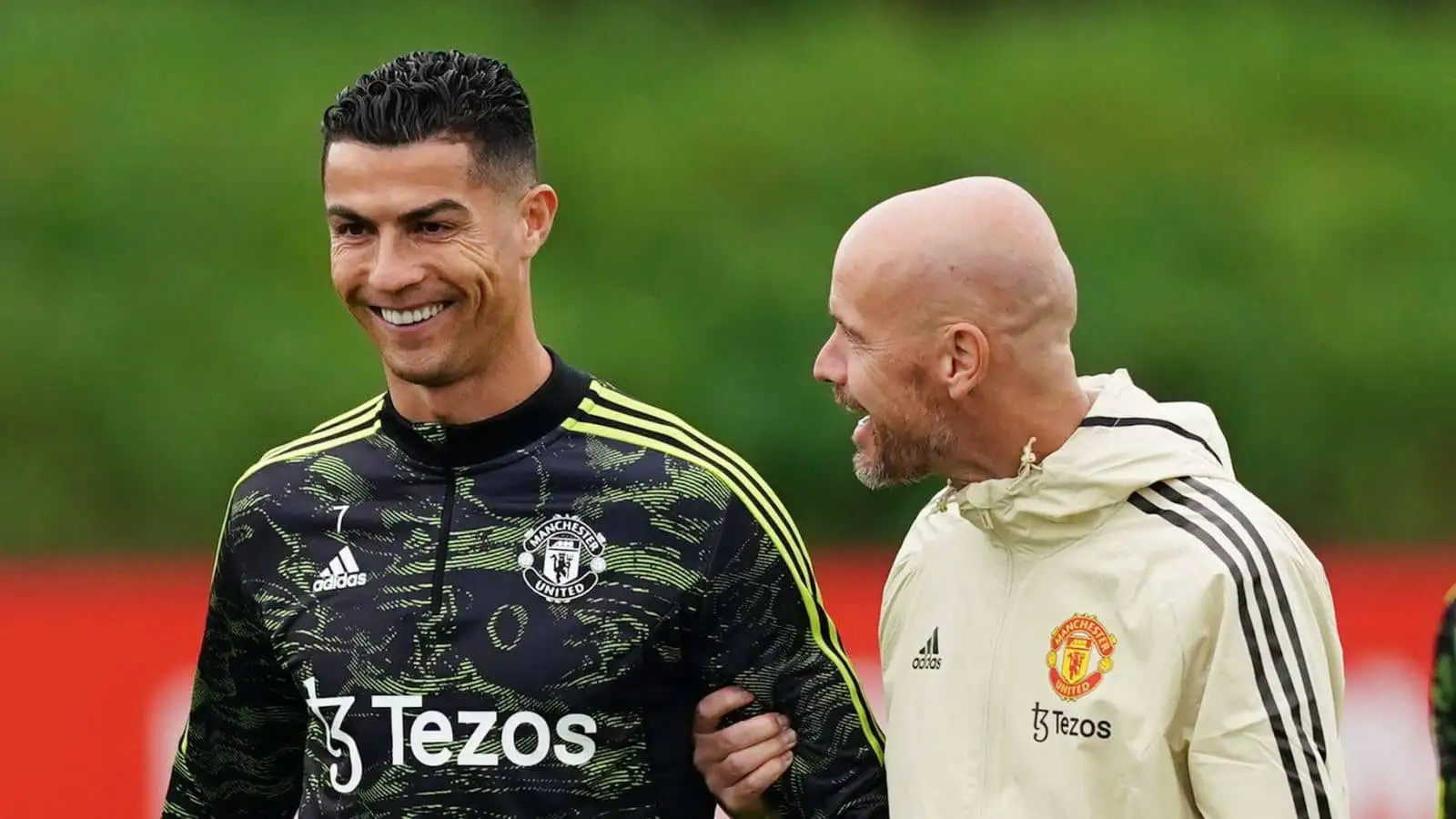 Cristiano Ronaldo speaks to manager Erik ten Hag during a training session at the Aon Training Complex, Greater Manchester