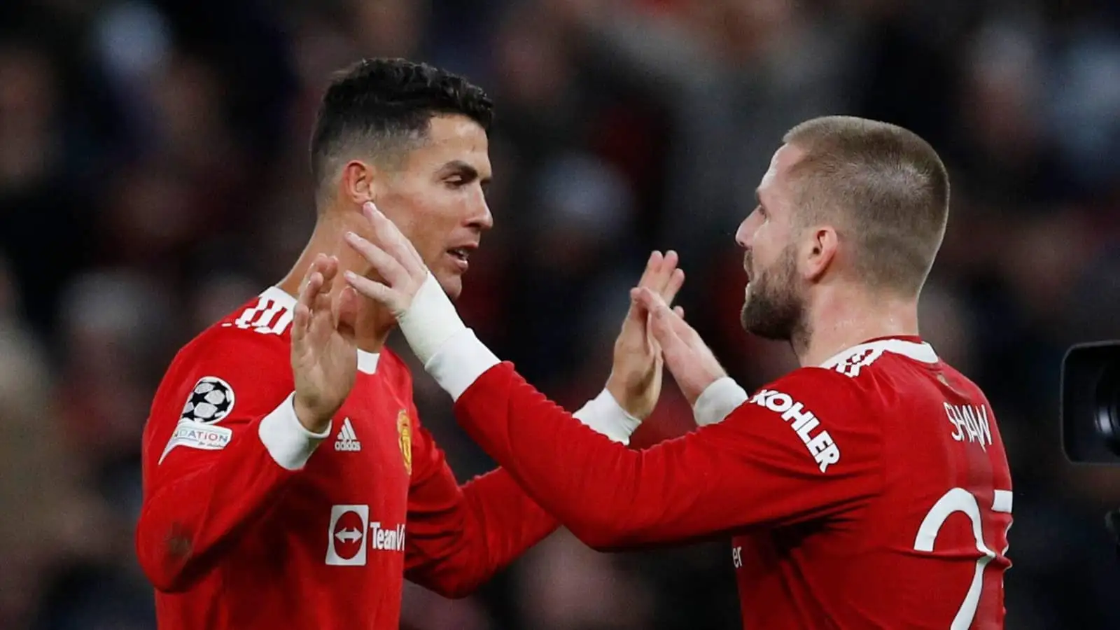 Cristiano Ronaldo embraces Luke Shaw