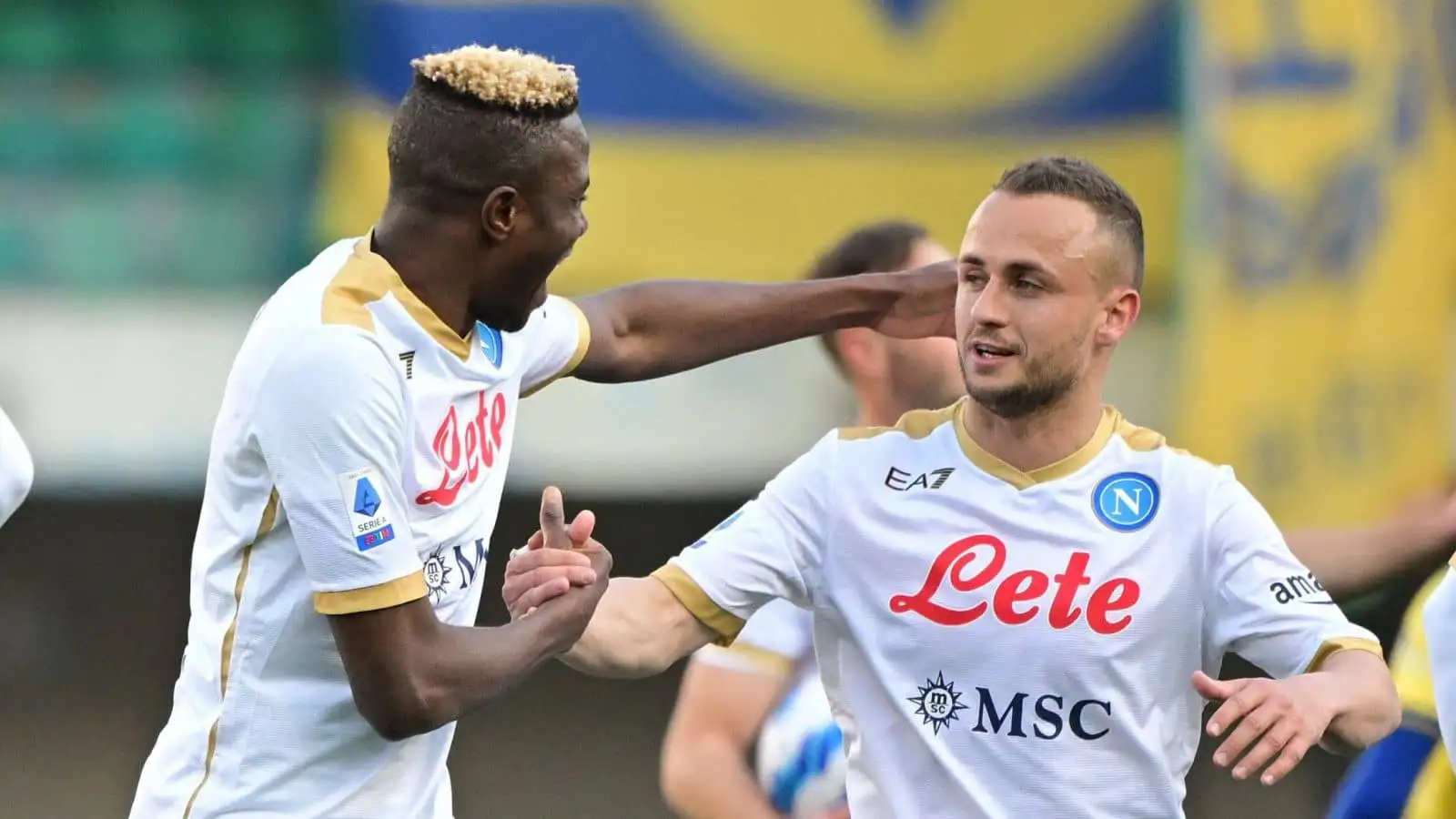 Stanislav Lobotka celebrates with Victor Osimhen after Napoli beat Hellas Verona in Serie A