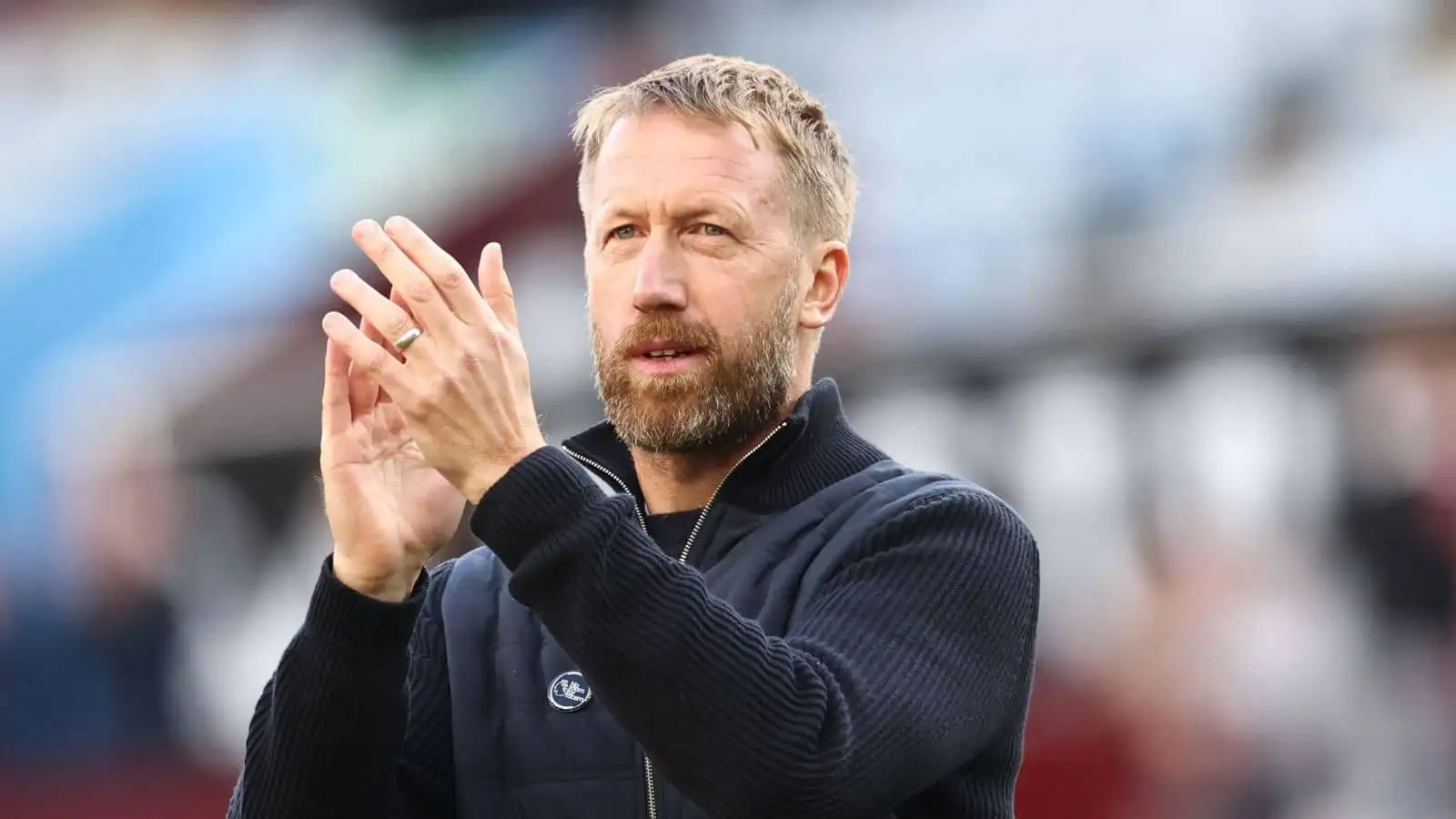 Graham Potter manager of Chelsea applauds the fans during the Premier League match at Villa Park, Birmingham