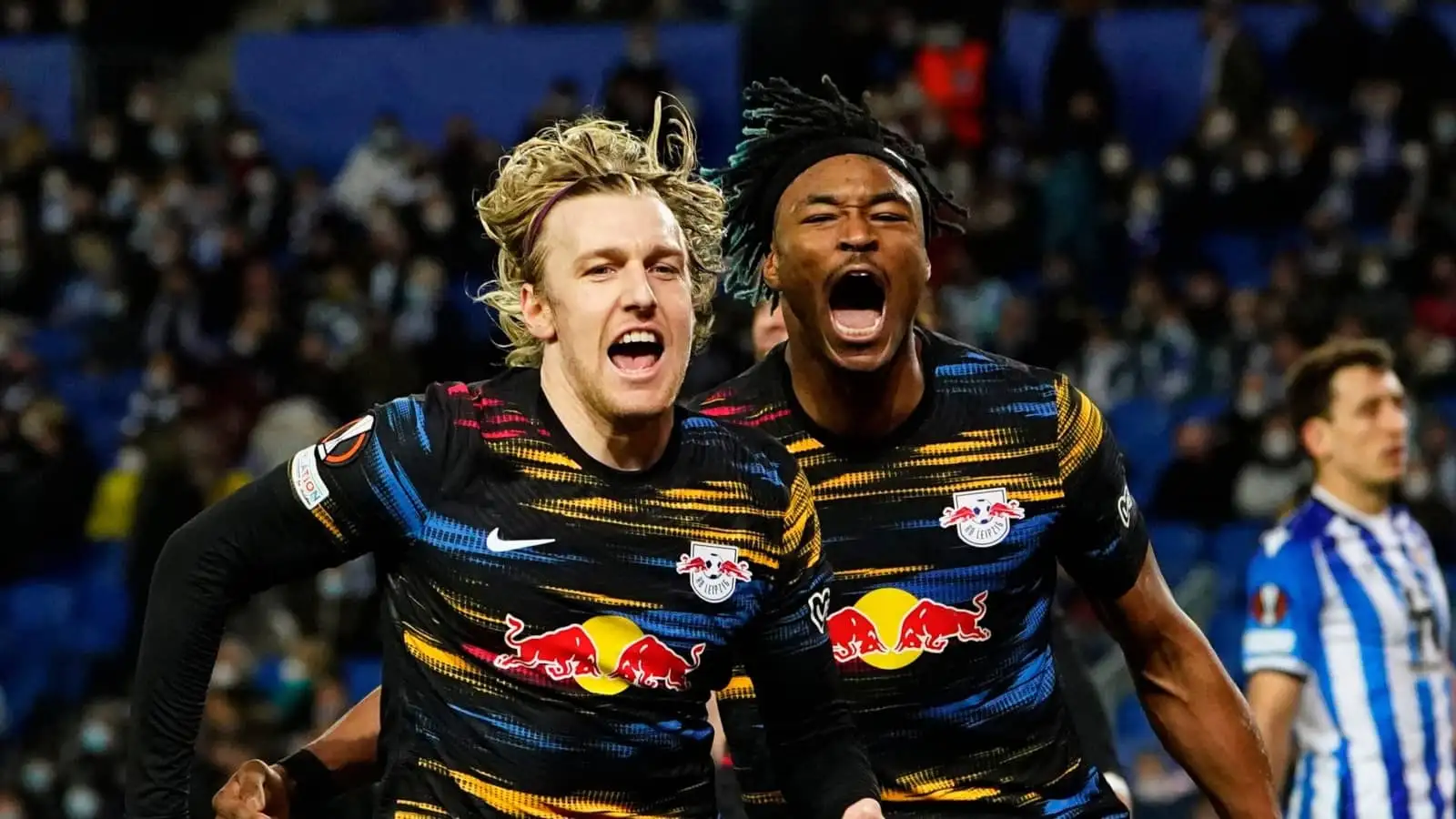 Emil Forsberg and Mohamed Simakan of RB Leipzig