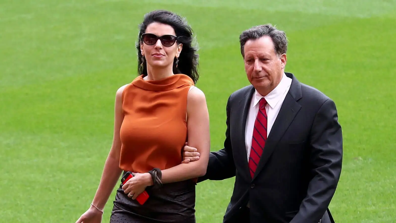 Linda Pizzuti wife of Liverpool owner John W Henry (left) with Tom Werner ahead of the opening of the Anfield Main Stand, Liverpool