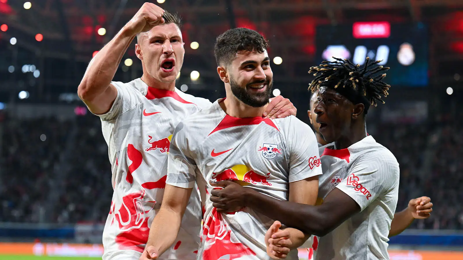 Leipzig's Willi Orban (from left) Josko Gvardiol and Amadou Haidara react after the 1:0.