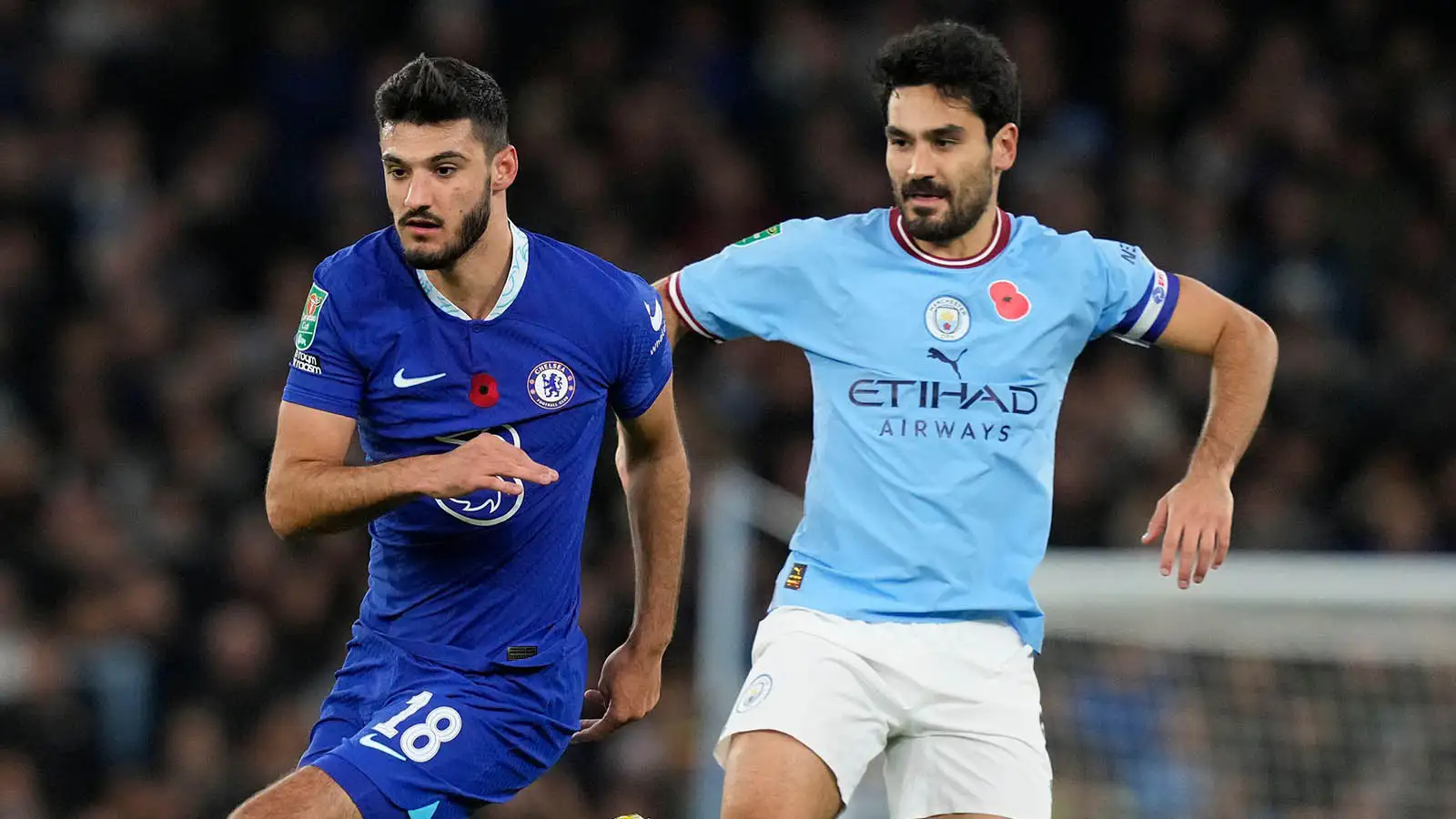 Armando Broja of Chelsea goes past Ilkay Gundogan of Manchester City