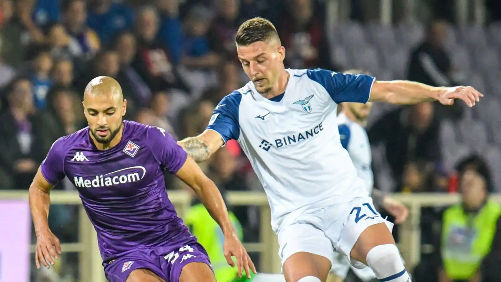 Fiorentina's Sofyan Amrabat fights for the ball against Lazio's Sergej Milinkovic-Savic - Florence, Italy: Florence, Italy, Artemio Franchi Stadium