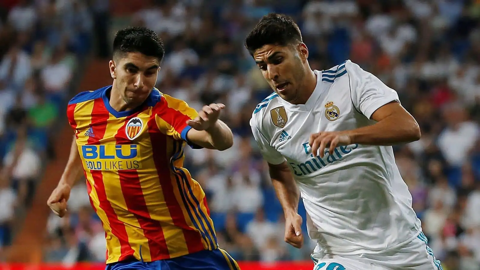 Real Madrid’s Marco Asensio in action with Valencia's Carlos Soler at the Bernabeu Stadium, LaLiga