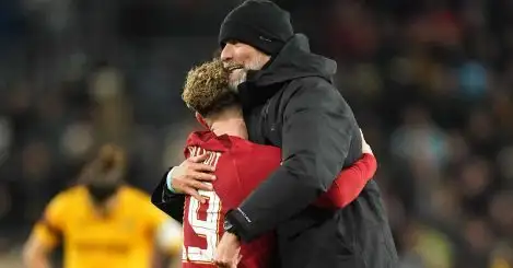 Jurgen Klopp embracing Harvey Elliott