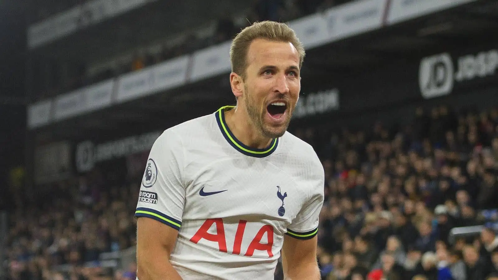 Harry Kane poses in full American Football attire