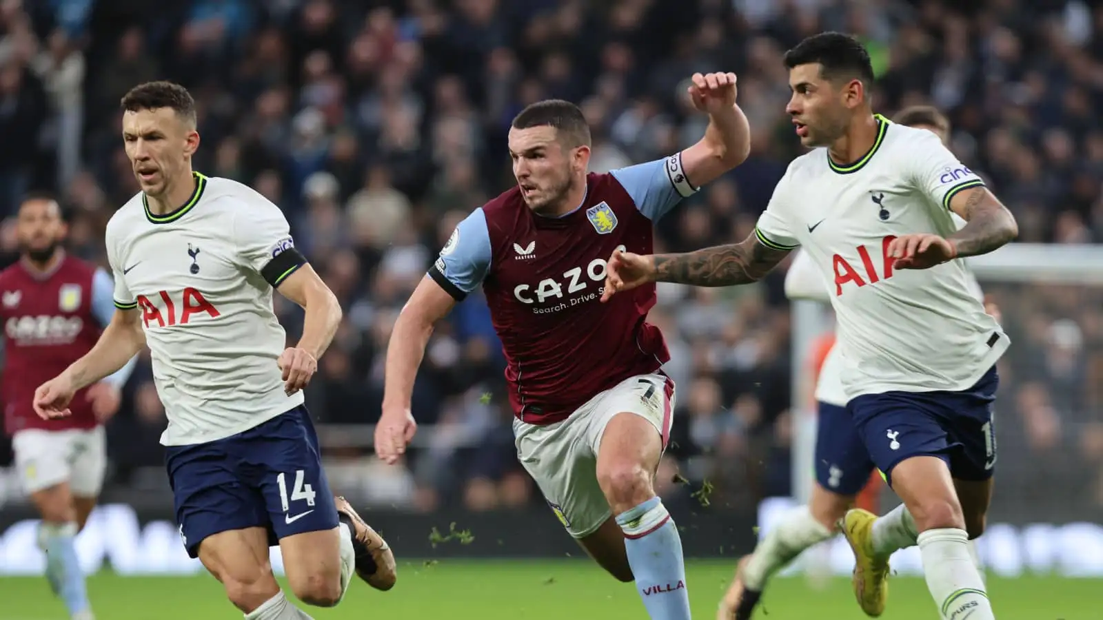 Tottenham defenders Ivan Perisic and Cristian Romero alongside Aston Villa midfielder John McGinn