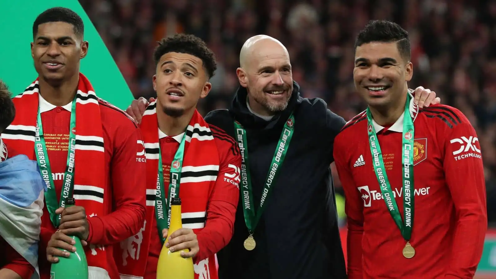 Marcus Rashford, Jadon Sancho, Erik ten Hag, Manager of Manchester United and Casemiro of Manchester United celebrate after the Carabao Cup match at Wembley Stadium, London