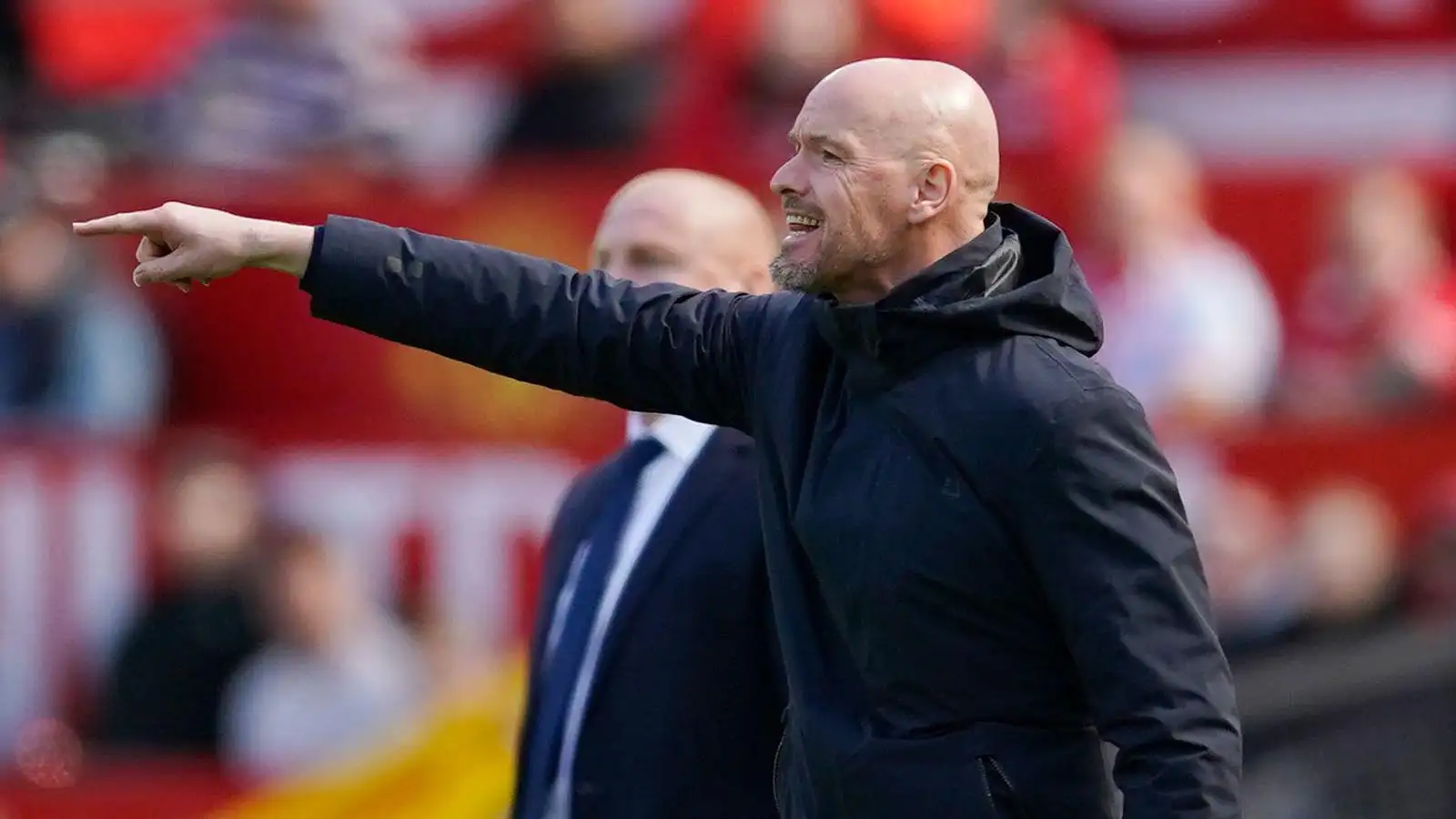 Manchester United's head coach Erik ten Hag gestures during the English Premier League soccer match between Manchester United and Everton, at the Old Trafford stadium in Manchester, England, Saturday, April 8, 2023.