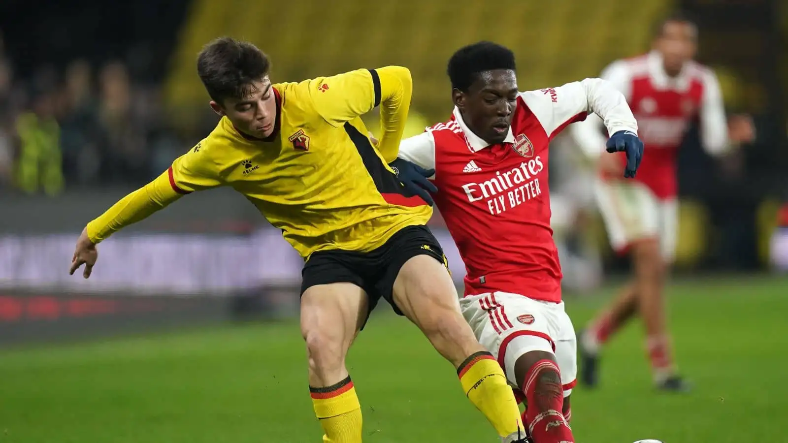 Watford's Harry Amass and Arsenal's Amario Cozier-Duberry (right) battle for the ball during The FA Youth Cup fifth round match at Vicarage Road, Watford