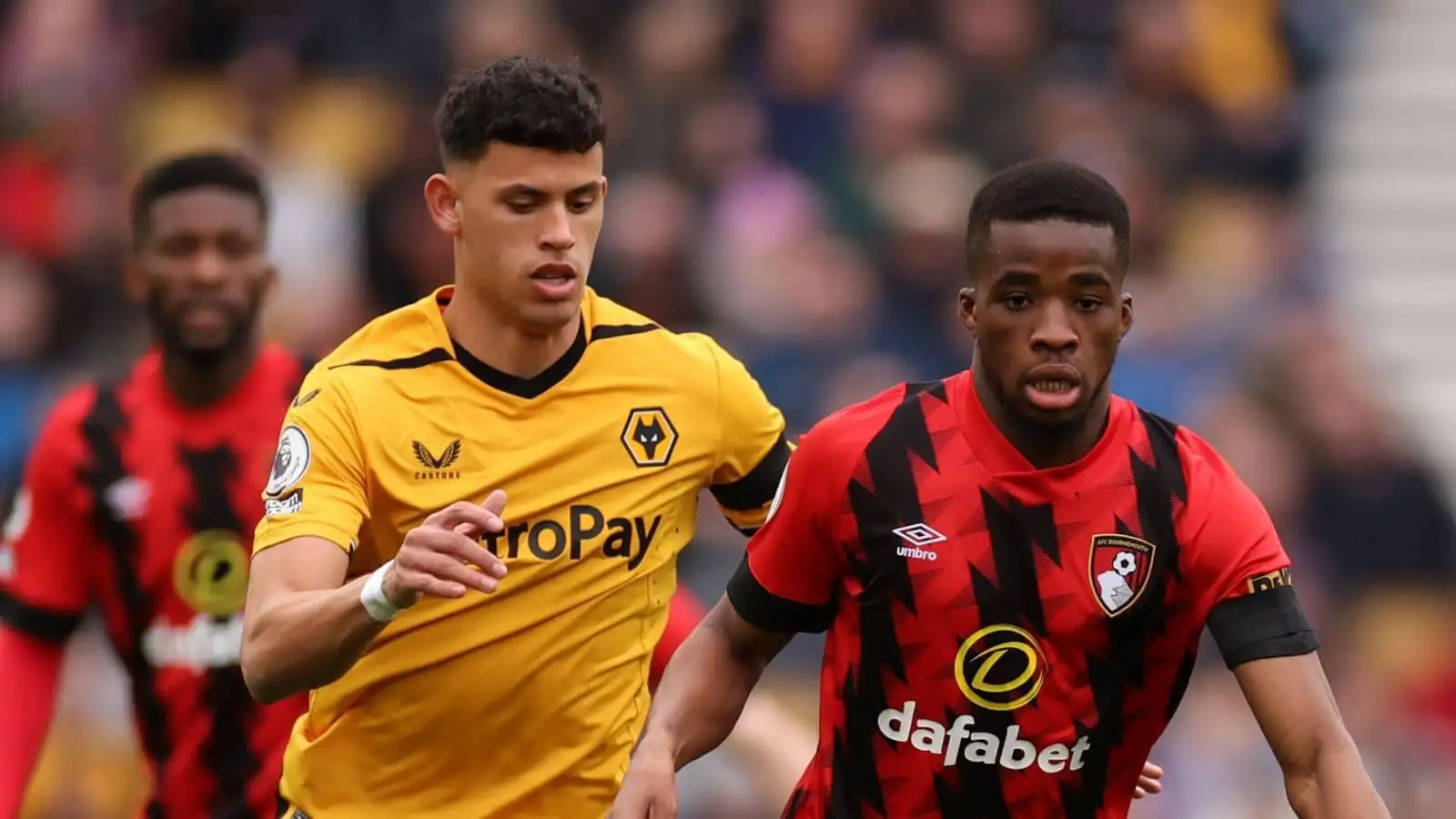 Matheus Nunes, Hamed Junior Traore Wolves v Bournemouth during Premier League game at Molineux