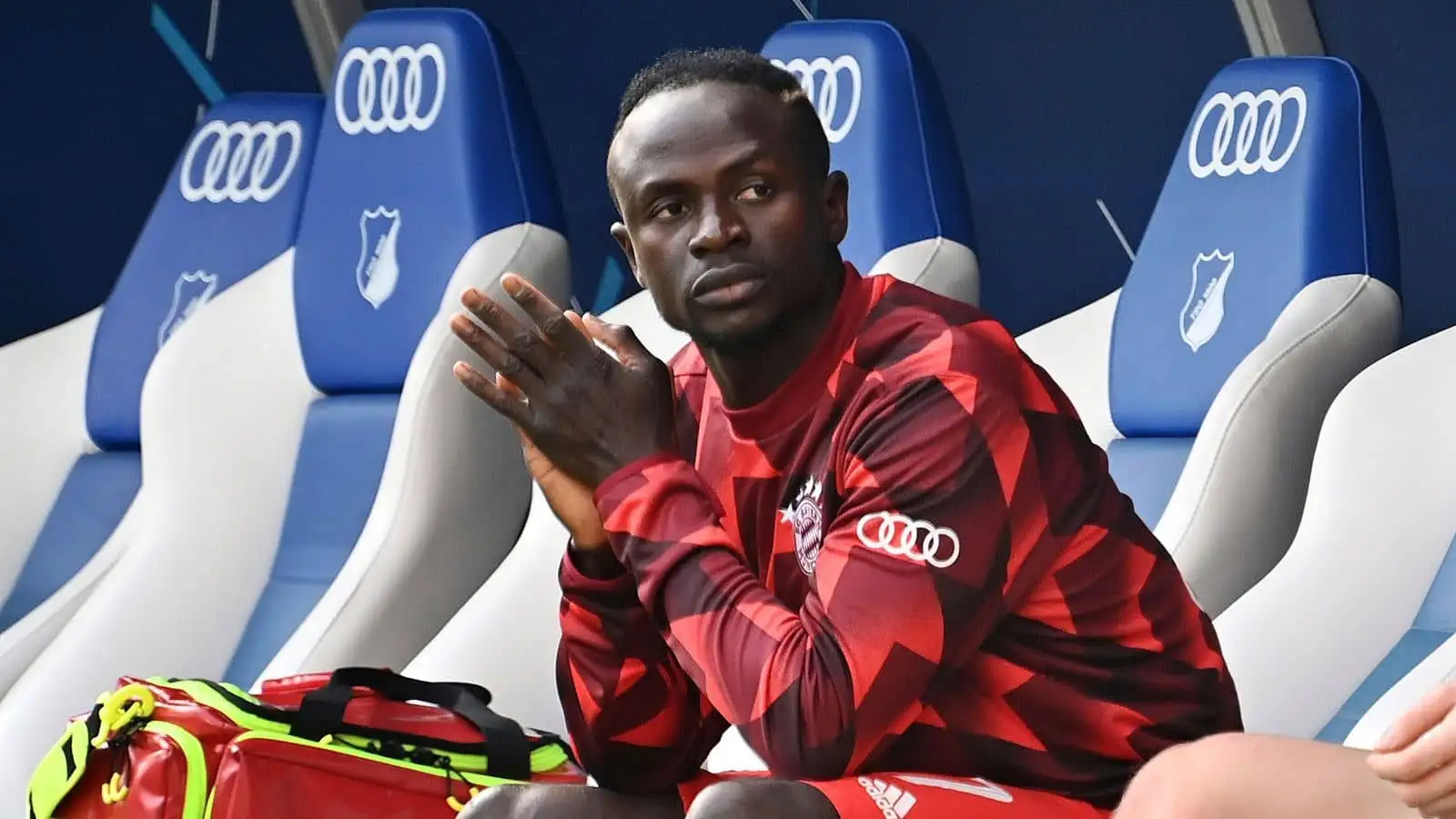 Sadio Mane of Bayern Munich sat alone on the substitutes bench during Bundesliga game v Hoffenheim at PreZero Arena