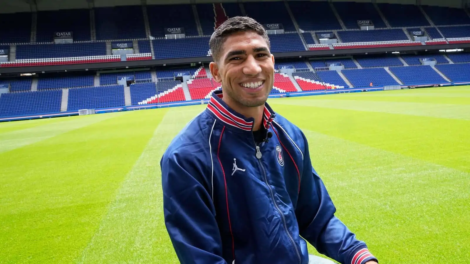 Achraf Hakimi of Paris Saint-Germain smiles during an interview at the Parc des Princes stadium