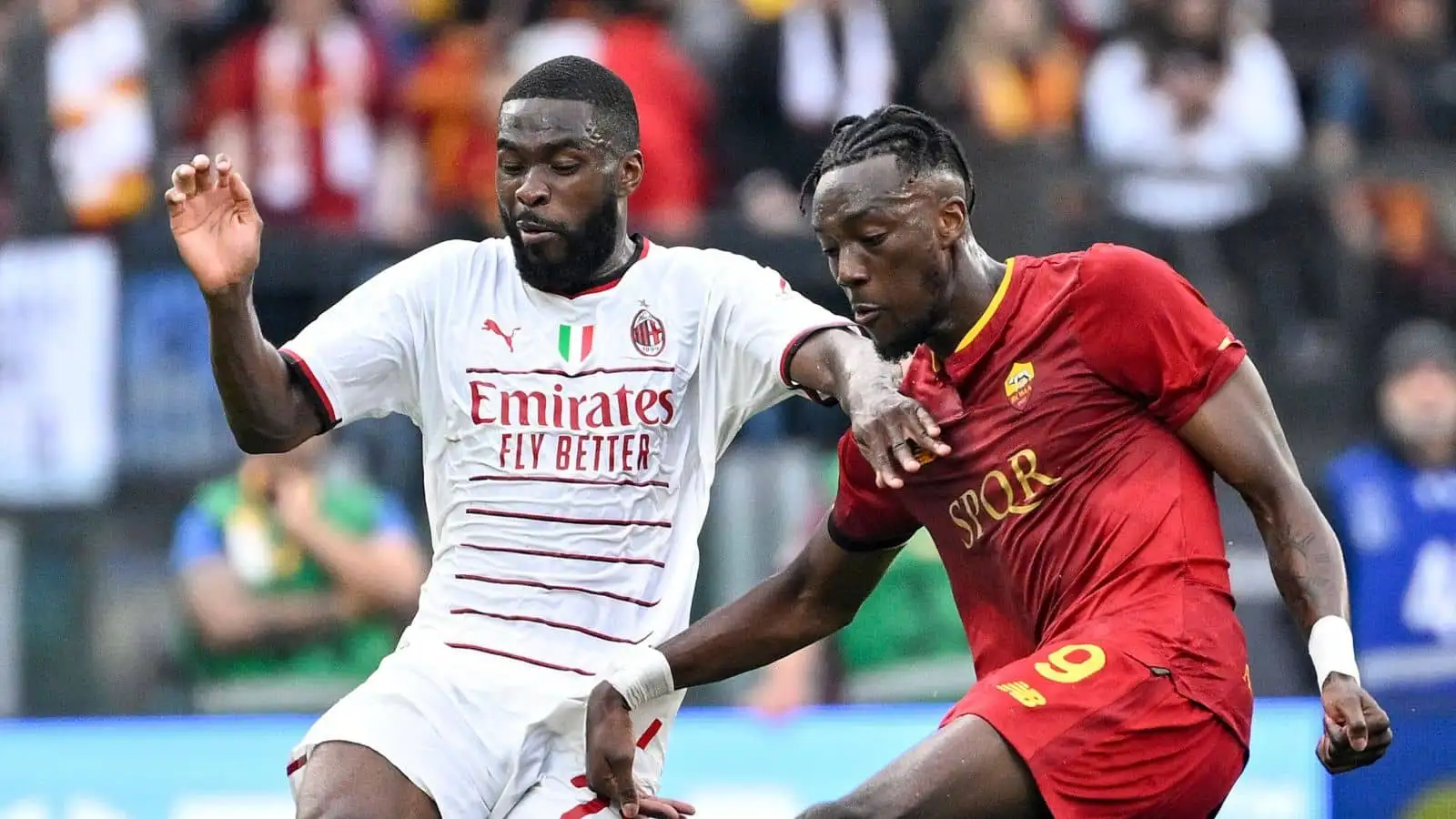Fikayo Tomori of AC Milan and Tammy Abraham of AS Roma compete for the ball during the Serie A football match between AS Roma and AC Milan at Olimpico stadium in Rome