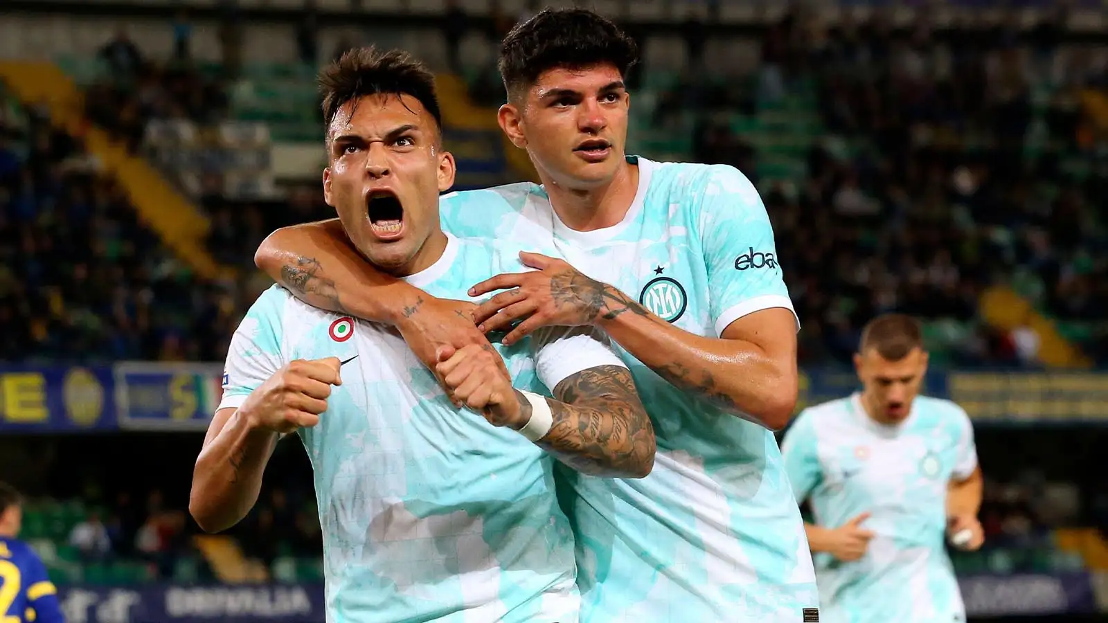 Inter Milan's Lautaro Martinez, left, celebrates scoring during the Serie A soccer match between Hellas Verona and Inter Milan at Marcantonio Bentegodi Stadium, Verona, Italy, Wednesday May 3, 2023.