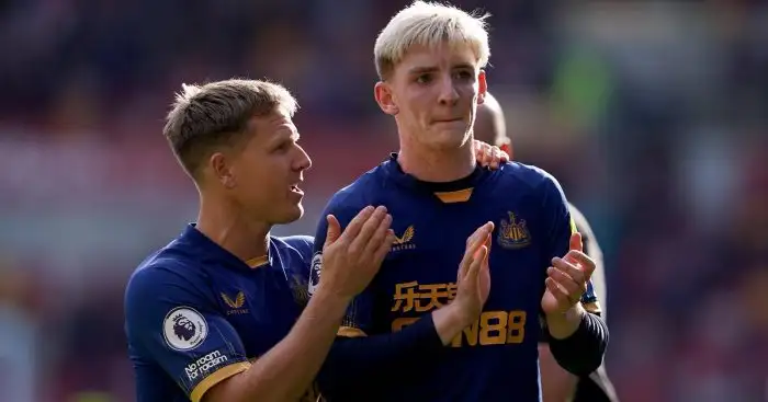 Newcastle United's Matt Ritchie speaks with team mate Anthony Gordon following the Premier League match at the Gtech Community Stadium, London. Picture date: Saturday April 8, 2023.