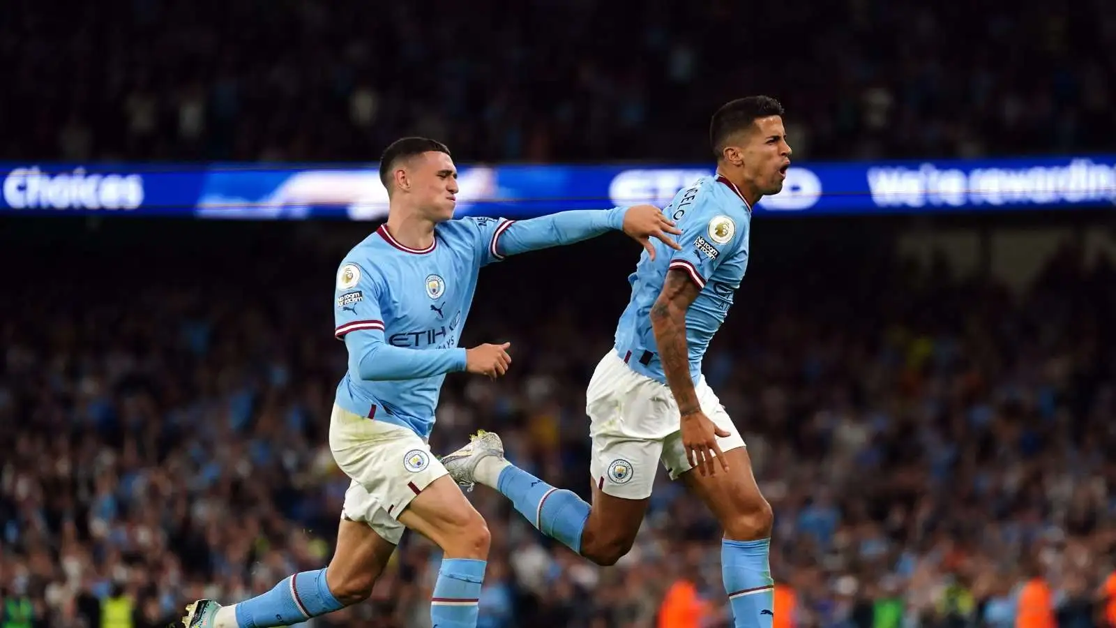 Phil-Foden-and-Joao-Cancelo-of-Manchester-City