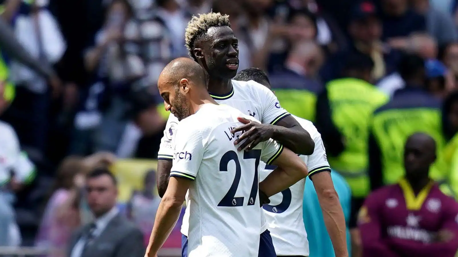 Tottenham Hotspur's Lucas Moura hugs team-mate Davinson Sanchez at the end of one of his final appearances for the club following the Premier League match at the Tottenham Hotspur Stadium, London.