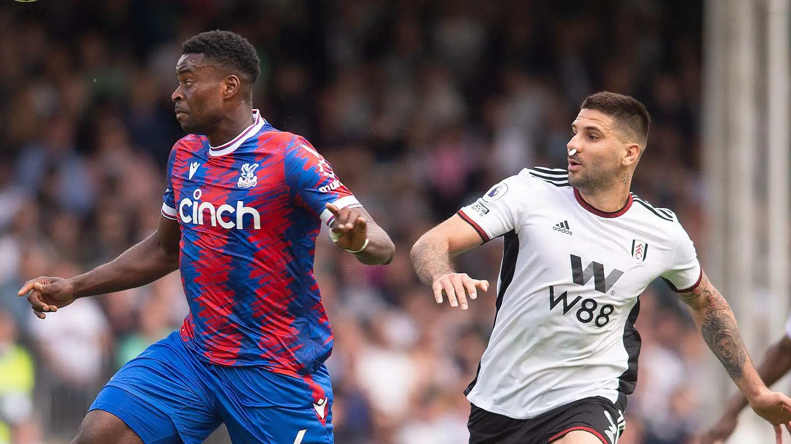 Marc Guéhi of Crystal Palace and Aleksandar Mitrović of Fulham during the Premier League match between Fulham and Crystal Palace at Craven Cottage, London, England on 20 May 2023.
