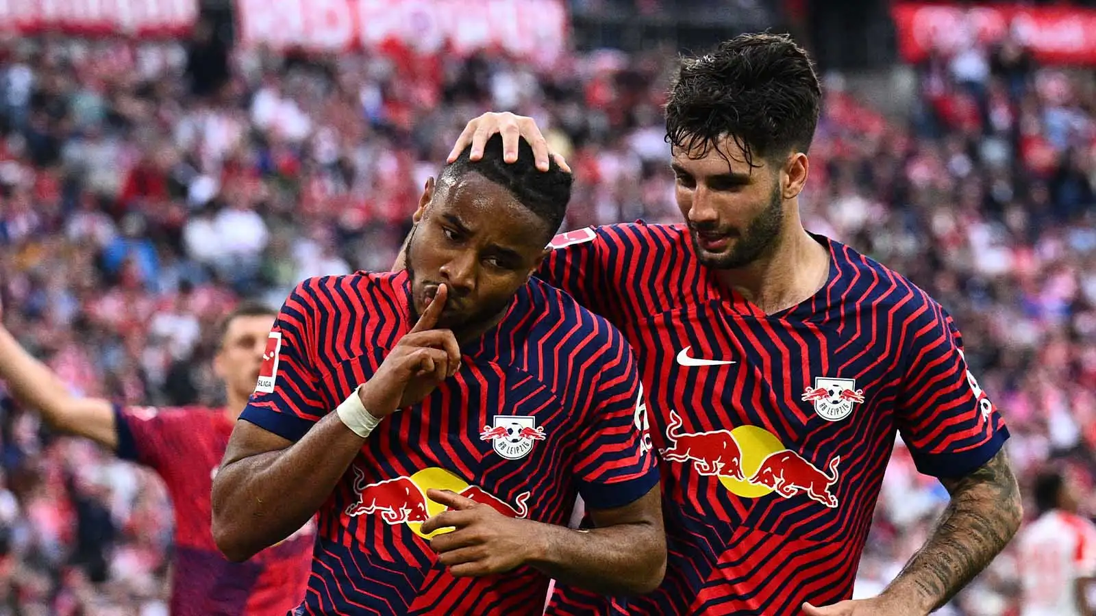 eipzig's Christopher Nkunku celebrates his goal with Leipzig's Dominik Szoboszlai to make it 1:2.