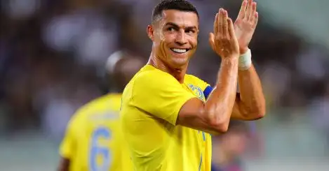 Cristiano Ronaldo applauding in the colours of Al Nassr during their friendly match against Paris Saint-Germain