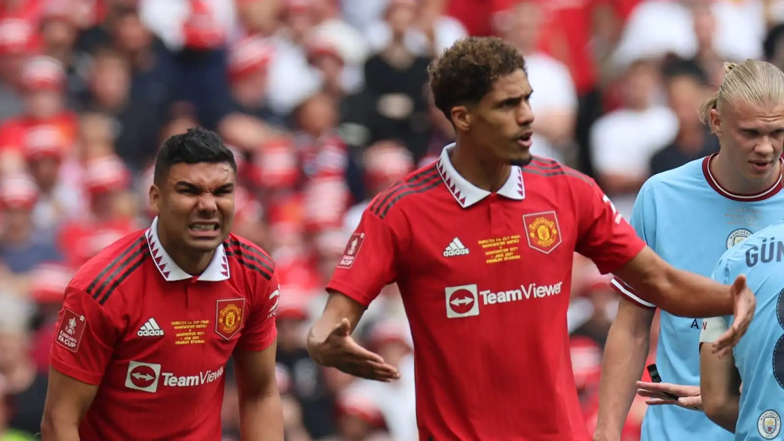 Casemiro and Raphael Varane of Man Utd