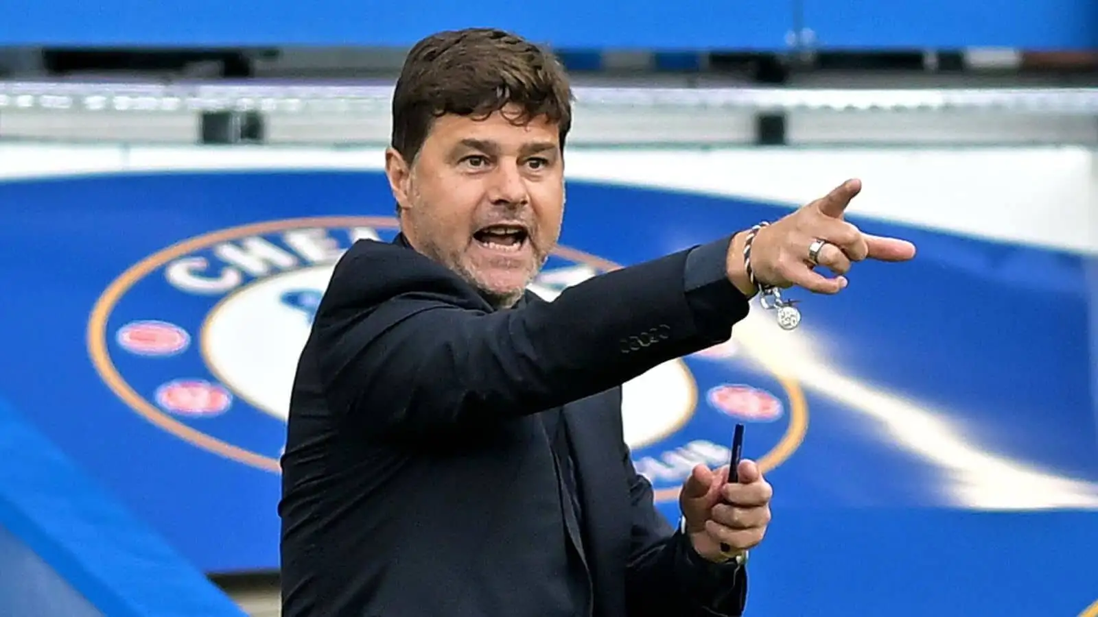 Mauricio Pochettino pointing from the Chelsea touchline
