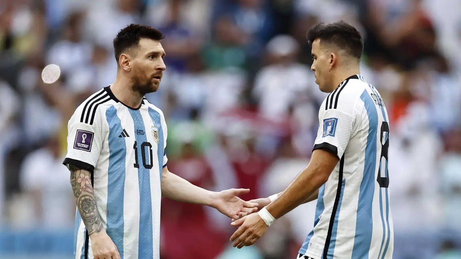 Lionel Messi and Marcos Acuna playing for Argentina during the 2022 World Cup