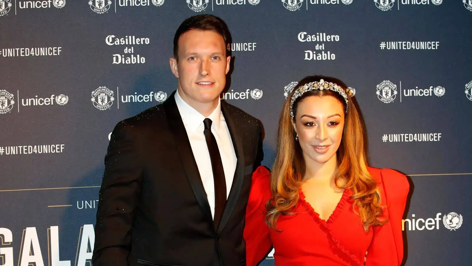 Phil Jones and wife Kaya Hall during the red carpet arrivals for the Manchester United United for Unicef Gala Dinner at Old Trafford