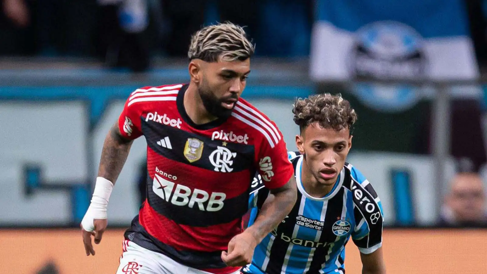 Bitello of Gremio battles for possession ball with Gabriel Barbosa of Flamengo