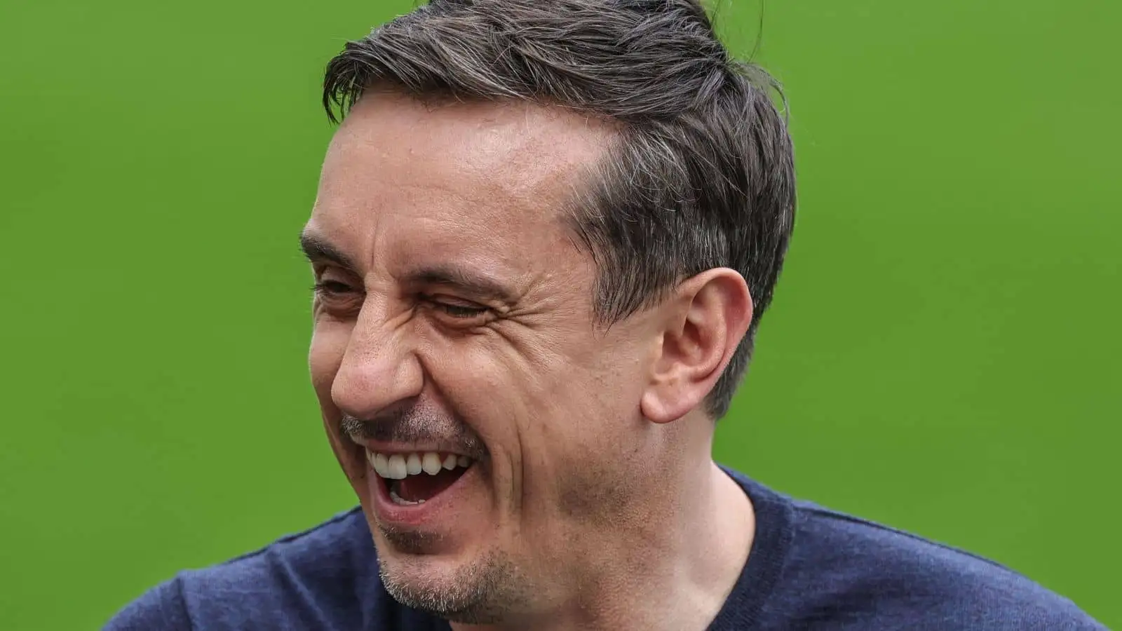 Gary Neville full of laughter during the Premier League match Newcastle United vs Arsenal at St. James's Park, Newcastle