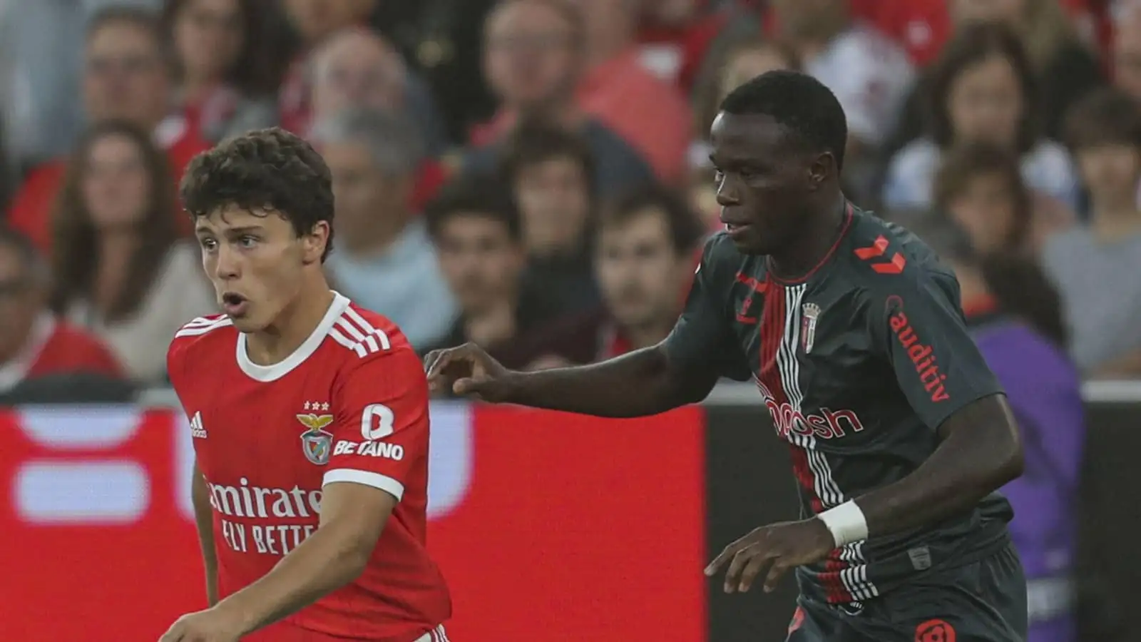 Joao Neves being chased by Braga player during Benfica match