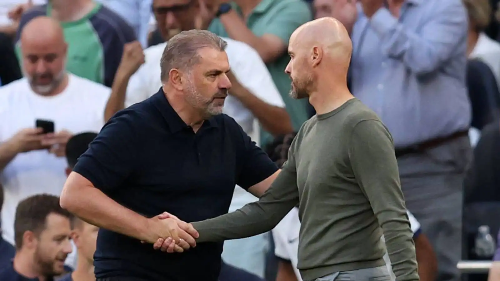 Tottenham manager Ange Postecoglou shaking hands with Man Utd manager Erik ten Hag