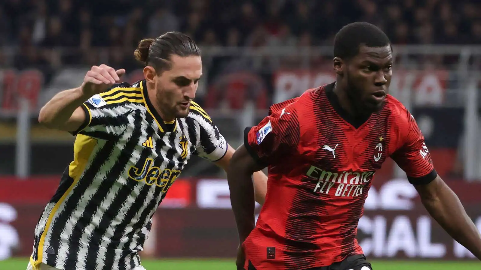 Yunus Musah of AC Milan is pursued by Adrien Rabiot of Juventus