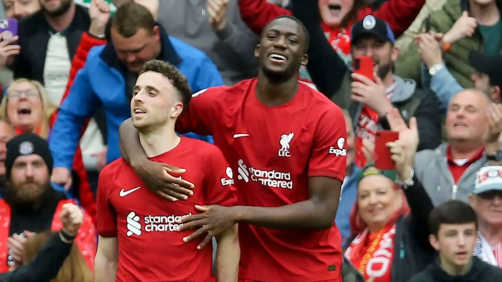 Diogo Jota of Liverpool (l) celebrates with his teammate Ibrahima Konate after scoring his teams 4th goal. Premier League match, Liverpool v Tottenham Hotspur at Anfield in Liverpool on Sunday 30th April 2023