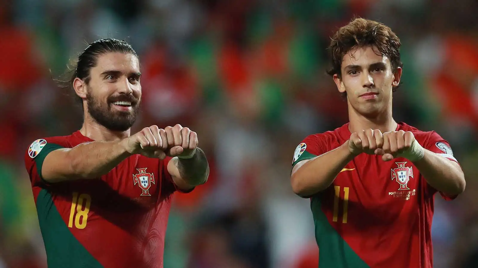 Ruben Neves and Joao Felix celebrate for Portugal