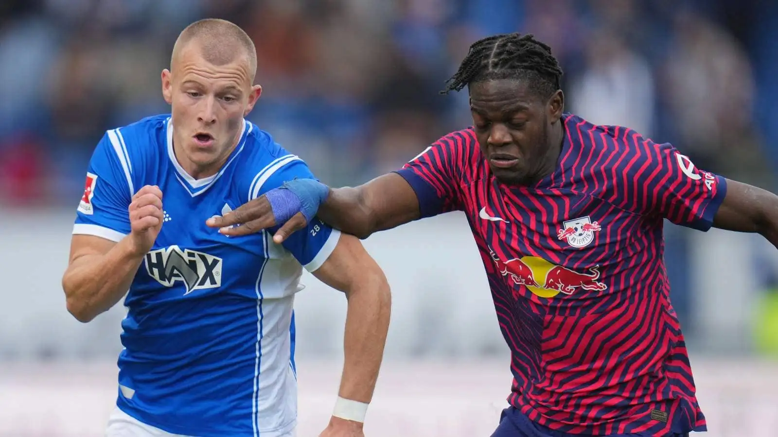 Darmstadt winger Tim Skarke and RB Leipzig defender Castello Lukeba