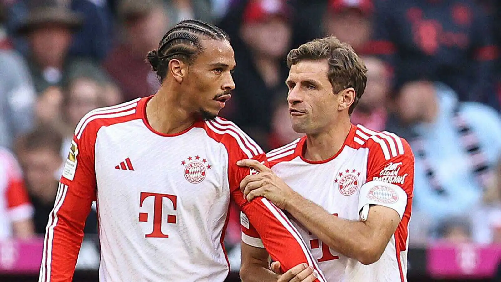 Leroy Sane and Thomas Muller of Bayern Munich