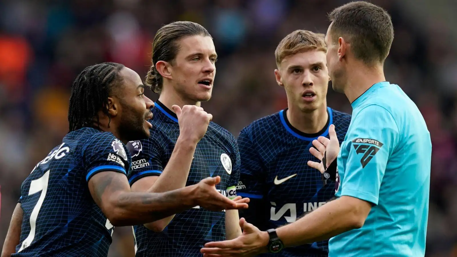 Chelsea trio Raheem Sterling, Conor Gallagher and Cole Palmer argue with the referee