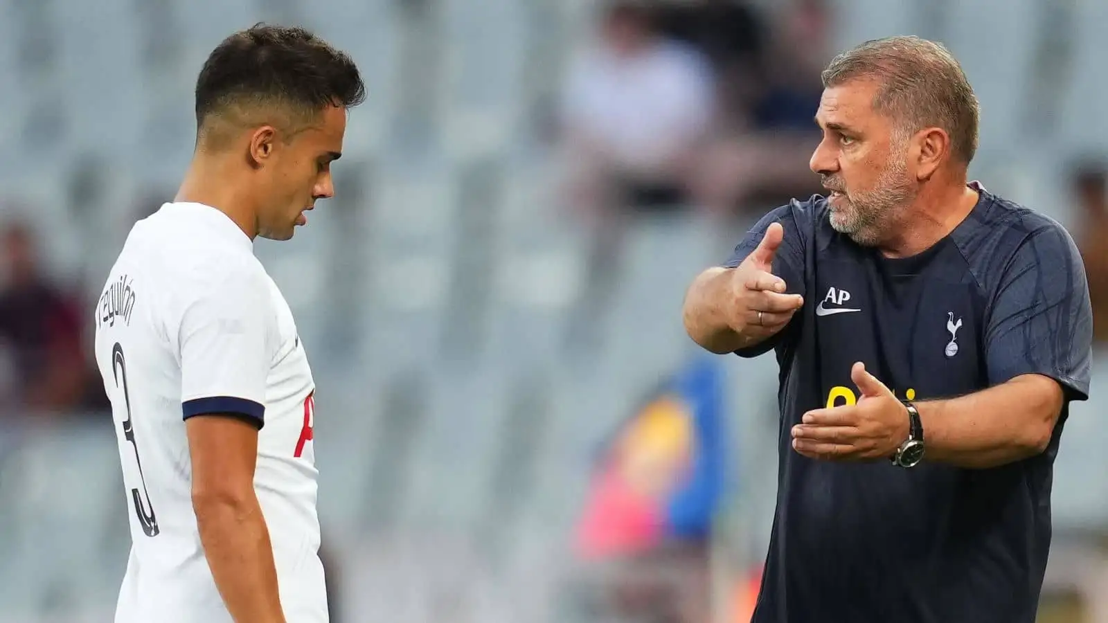 Sergio Reguilon receiving instructions from Ange Postecoglou