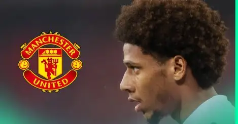 Jean-Clair Todibo with a prominent Manchester United badge alongside him