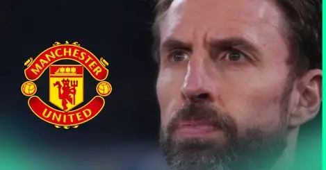 A close-up shot of Gareth Southgate with a prominent Man Utd badge alongside him