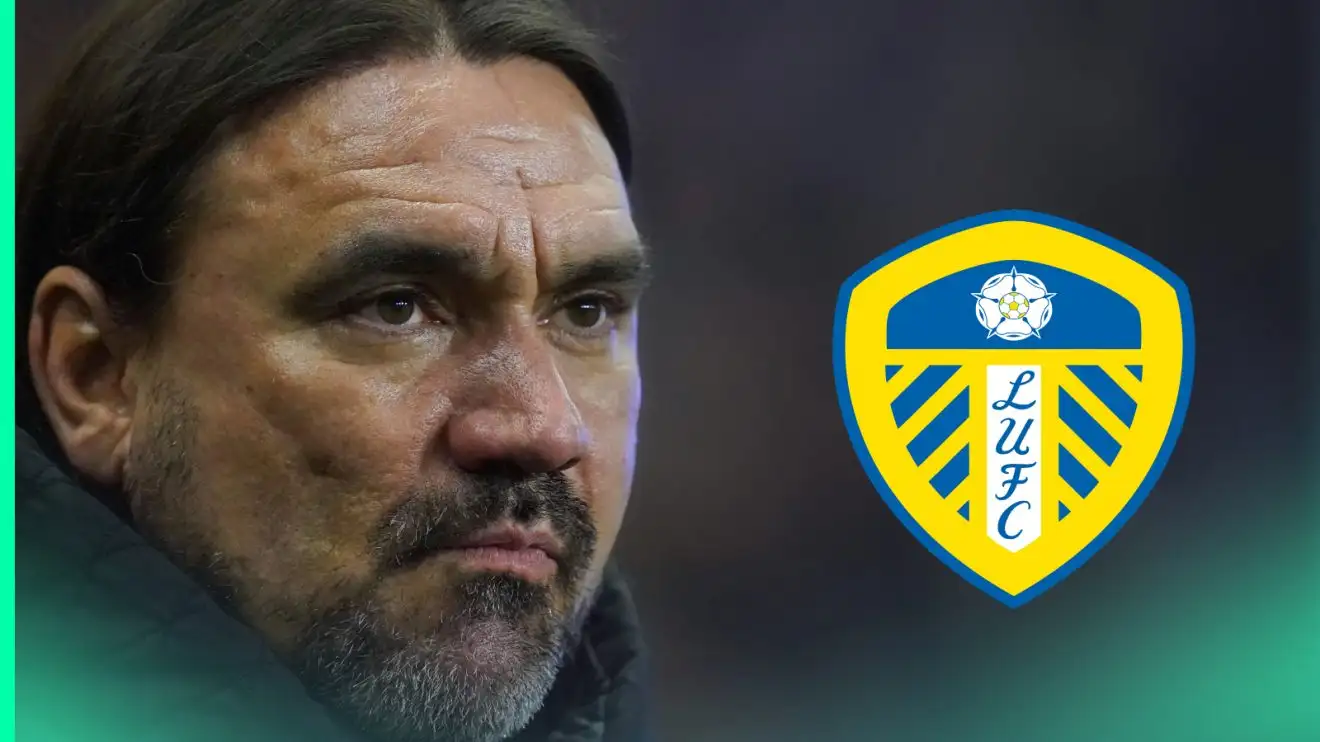 A close-up shot of Daniel Farke with a prominent Leeds United badge alongside him