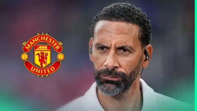 Rio Ferdinand next to the Manchester Unitred badge
