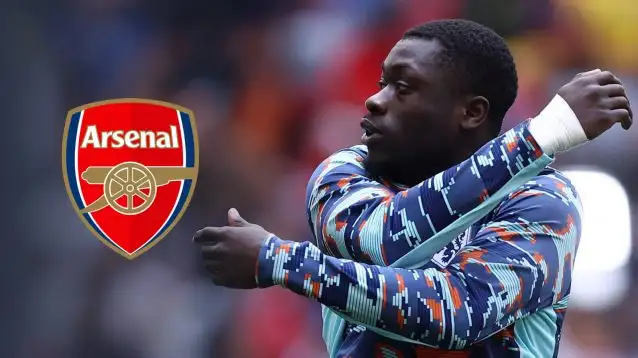 Brian Brobbey with Arsenal badge